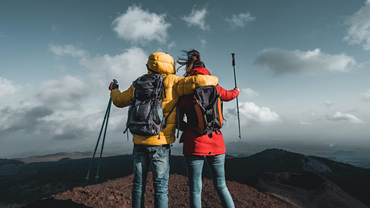 back-view-of-a-couple-of-hikers-with-backpack